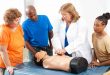 Adults Learning First Aid CPR